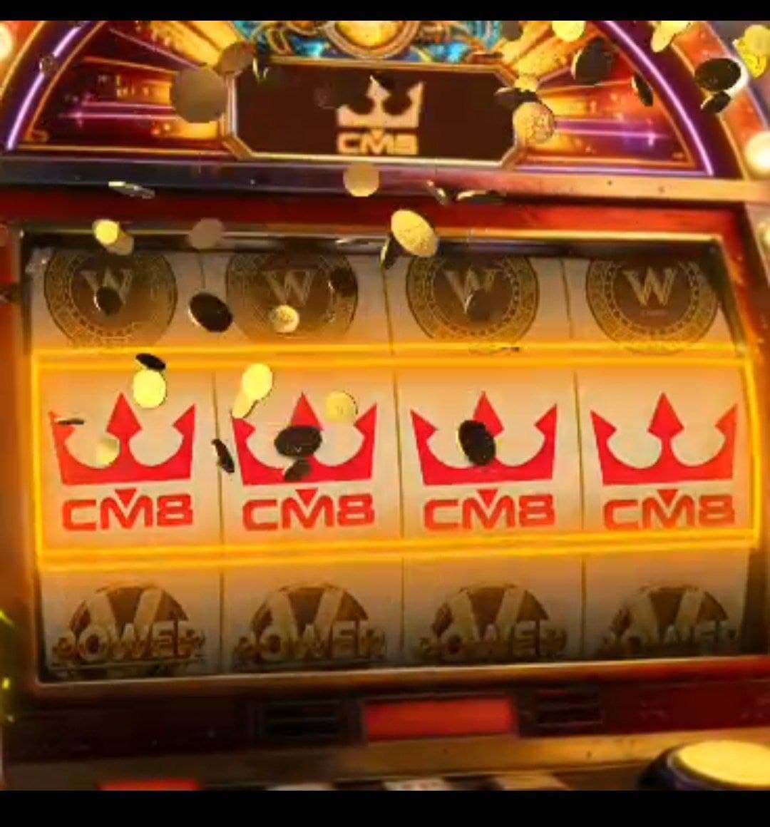 Slot machine displaying a winning line of red crown symbols with cascading gold coins.